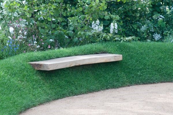 creative garden decor ideas bench concrete slab green plant wall