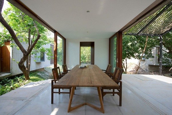 terrace table solid wood chairs house on a stream