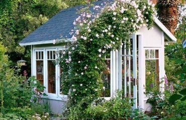 elegant-romantic-backyard-cottage-with-beautiful-blooming-flowers