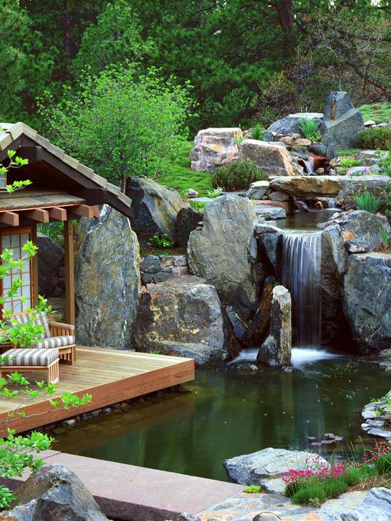 landscape design ideas natural stones waterfall wooden deck outdoor furniture