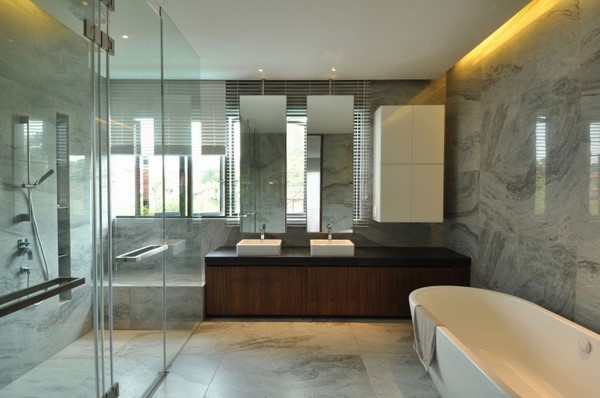 large bathroom marble tiles double vanity black top walk in shower tub