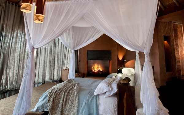 luxury bedroom design canopy bed fireplace