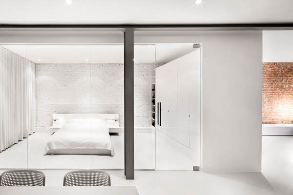 minimalist pure white glass doors brick wall