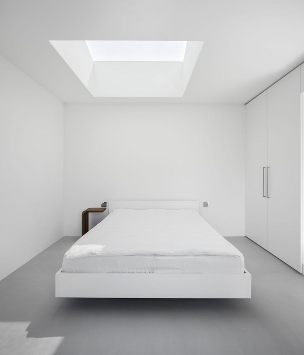 minimalist bedroom pure white skylights wardrobe Haus von Arx