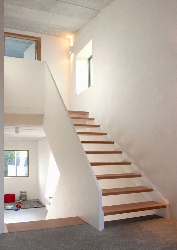 minimalist house interior white wall railings wooden steps