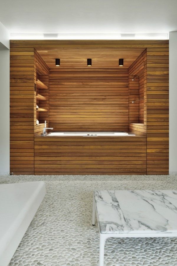 modern bathroom design ideas wooden cladding bathtub shelves pebbles House