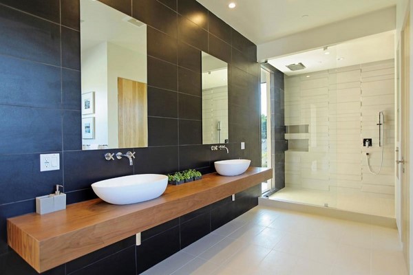 contemporary bathroom sink wooden countertop black wal tiles
