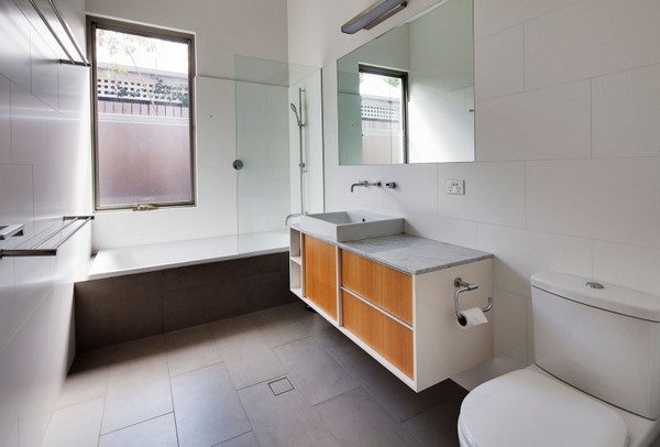 modern bathroom white wall tiles vanity cabinet wooden fronts Maylands