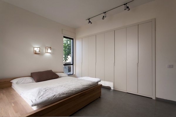 modern bedroom platform bed beige wardrobe