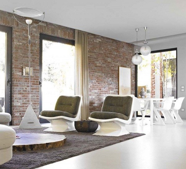 modern home interior design stylish brick wall green upholstery carpet coffee table pendant light