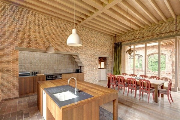 modern kitchen island ideas cooking dining area brick wall Astley Castle
