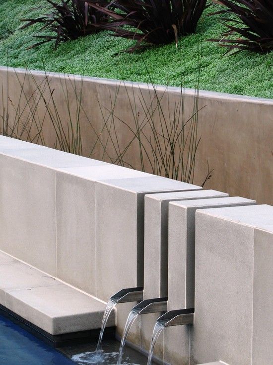modern minimalist garden design concrete retaining wall water basin