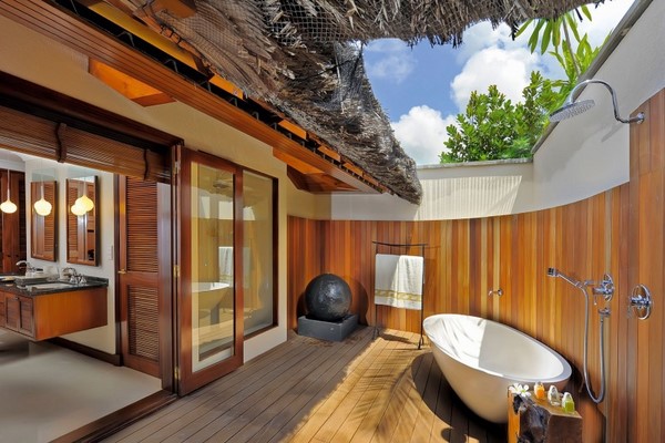 outdoor bathroom wooden cladding external shower Constance Lemuria Seychelles