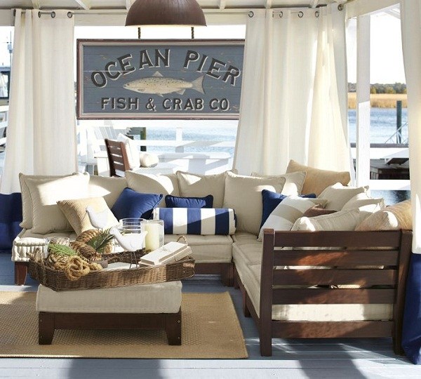 outdoor-sectional-furniture-low-wooden-platform-thick-seating-cushions-white-upholstery-naval-decorative-accents