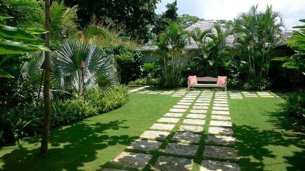patio design ideas grid path outdoor furniture palms exotic plants