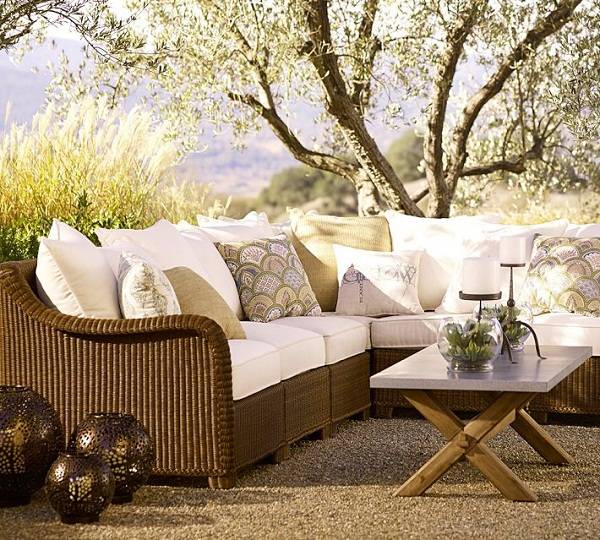 wicker-patio-furniture-comfortable-outdoor-sofa-decorative-pillows-low-coffee-table