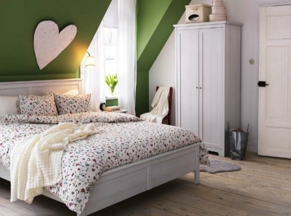 sloping ceiling Bedroom design attic ideas green accents white wall cabinet