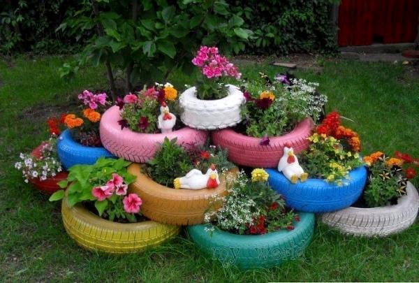 Garden Ideas flowers painted car tires figure