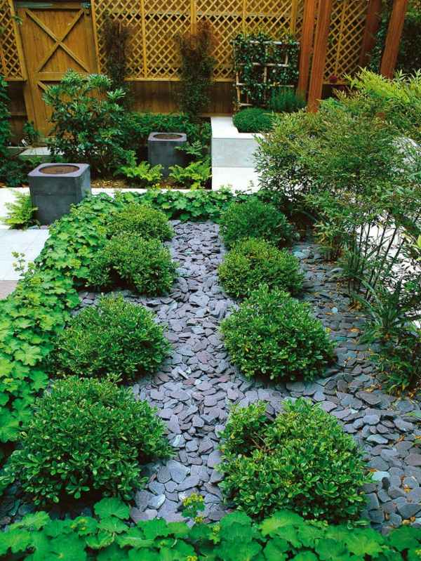 Natural stone evergreen plants garden design stones ideas