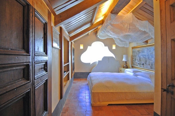 Palazzo Positano luxury villa bedroom interior sloped ceilings