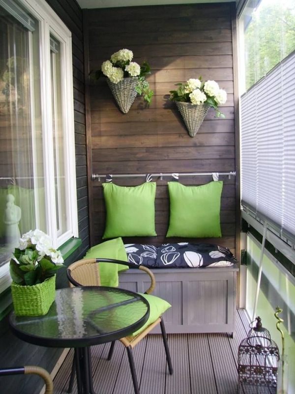  decorating with plants bench green pillows