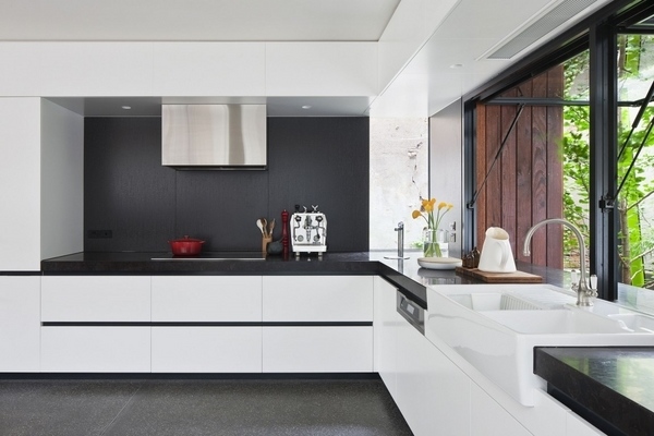 black white kitchen handle free cabinets minimalist design