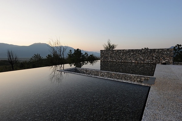 contemporary water house by li xiaodong atelier low stone wall