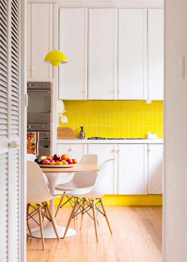 home yellow tiles white cabinets