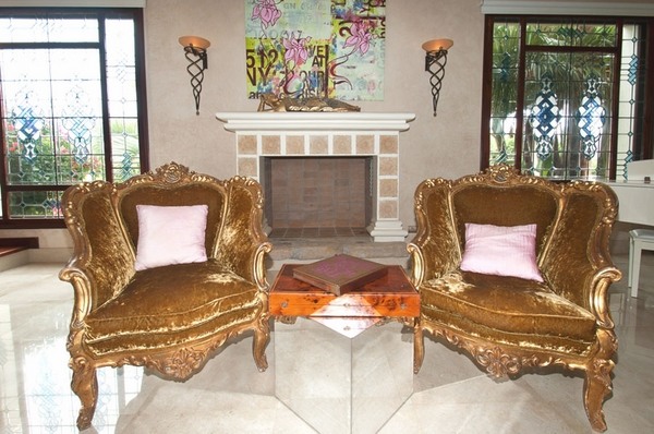 luxury Ibiza villa interior design large armchairs fireplace