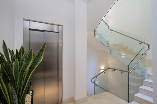 luxury mallorca modern villa interior staircase glass railings