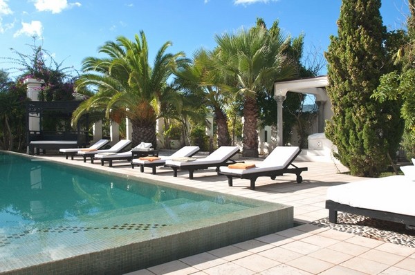 luxury villa Ibiza outdoor swimming pool patio furniture