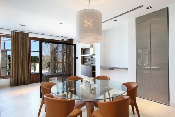 modern villa dining area glass table leather chairs