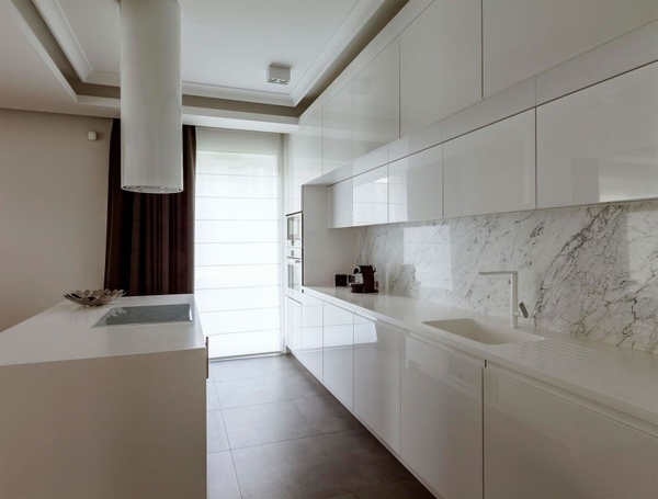 Modern minimalist style white kitchen with island