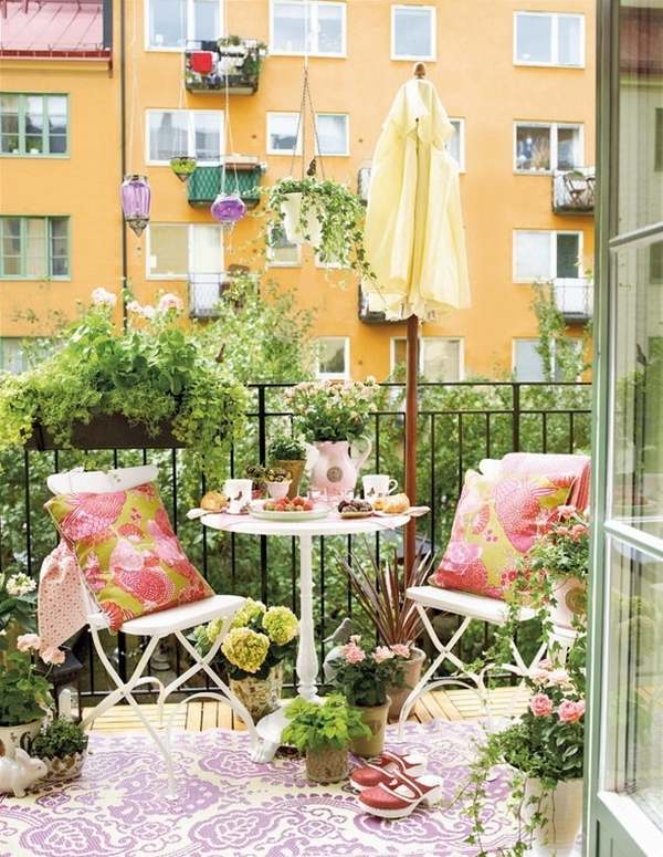 small balcony decoration ideas cofee table chairs colorful pillows