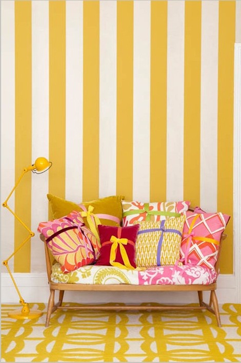 sunny yellow stripes on the wall reading corner