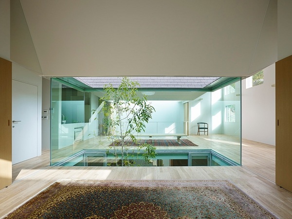 tomohiro hata architect atlas house flexible living and office space