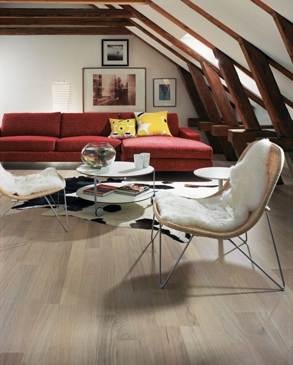 wooden floor living room light wood fur carpet sloping roof red sofa