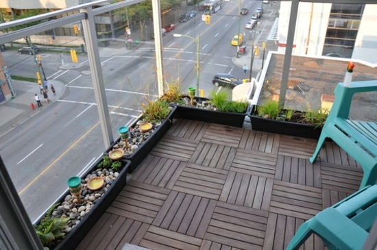 Balcony glass railing wooden tiles ground planters
