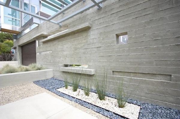 Concrete garden wall cool idea plant pebbles