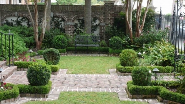 English garden hedges walkways brick wall