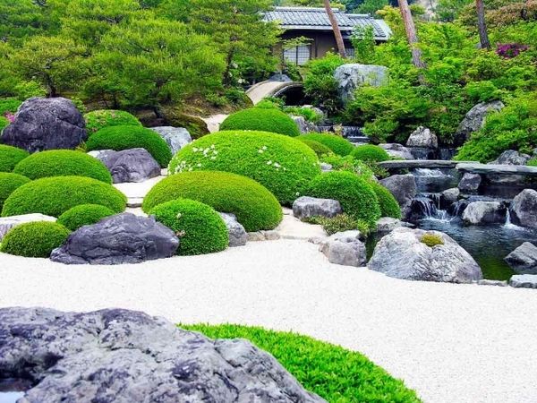 Japanese garden moss stone white pebble pond