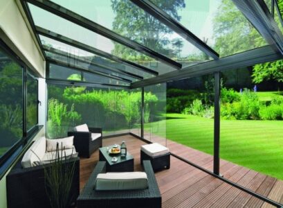 Sloping-roof-terrace-glass-roof-rattan-garden-furniture