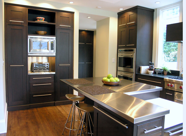 Stainless steel countertops black cabinetry