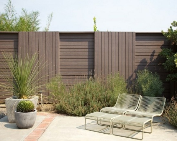 Wooden fence and Screening Plants metal furniture planters pots