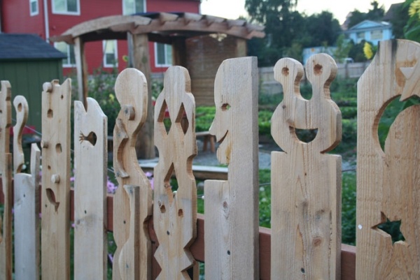 Wooden picket fence carved design