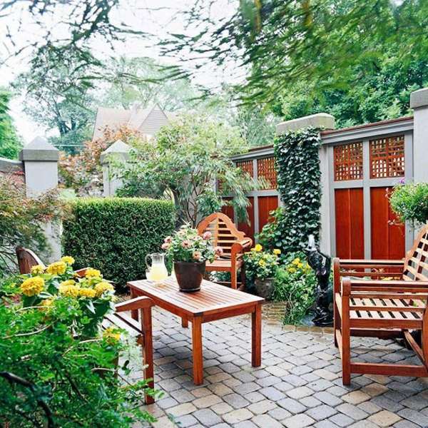 Wooden privacy fence garden planting stone tile furniture