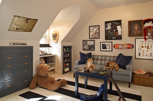 attic nursery with sloped roof sofa shelves