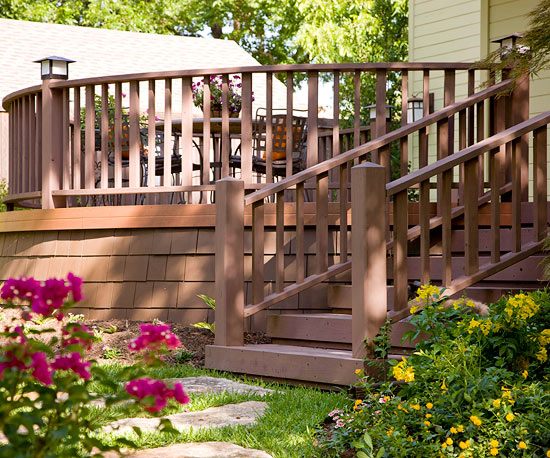 curved wooden patio deck wooden railing garden