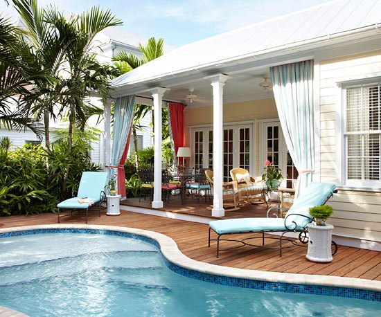 garden wooden patio deck sunbeds pool