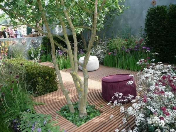 garden wooden deck stools flowers